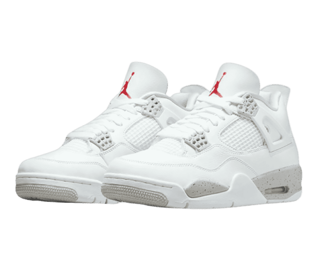 A white pair of AJ4 sneakers with speckled gray details on the lace cages and soles.