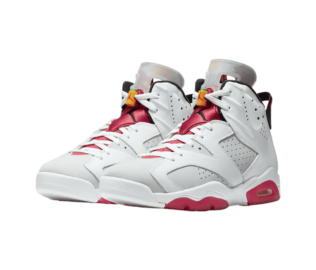 A suede pair of AJ6 “Hare” sneakers in shades of light gray with red accents on the soles and tongues.