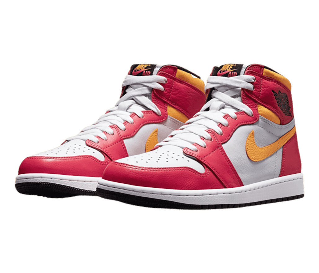 A white pair of AJ1 High sneakers with pinkish red overlays and orange-yellow tumbled leather collars and Swooshes.