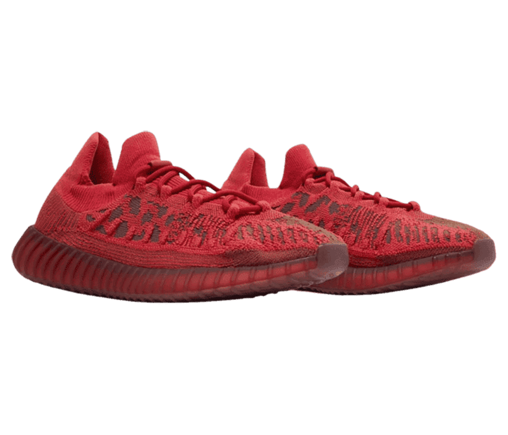 A pair of 'Red YEEZY 350 V2' sneakers in red with a
                      red and black booster sole, and red and black textured pattern.