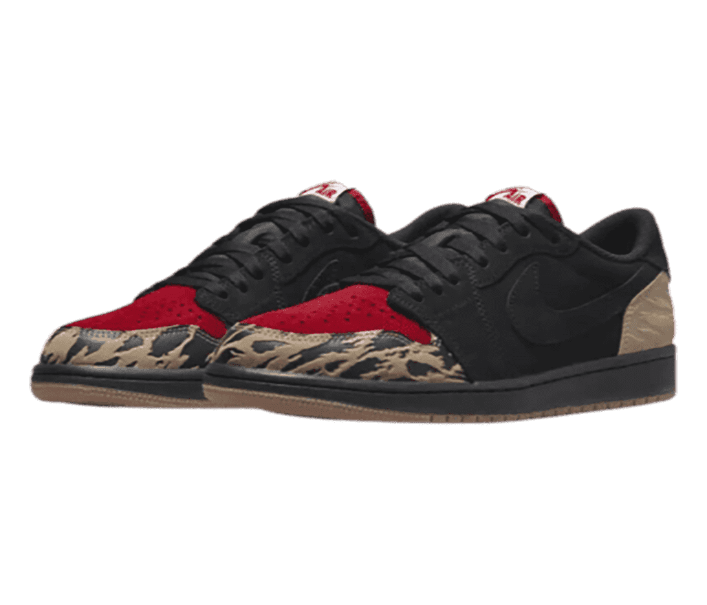 A black pair of SoleFly x AJ1 Low “Carnivore” sneakers with red suede toeboxes and brown animal-style print tips and heels.