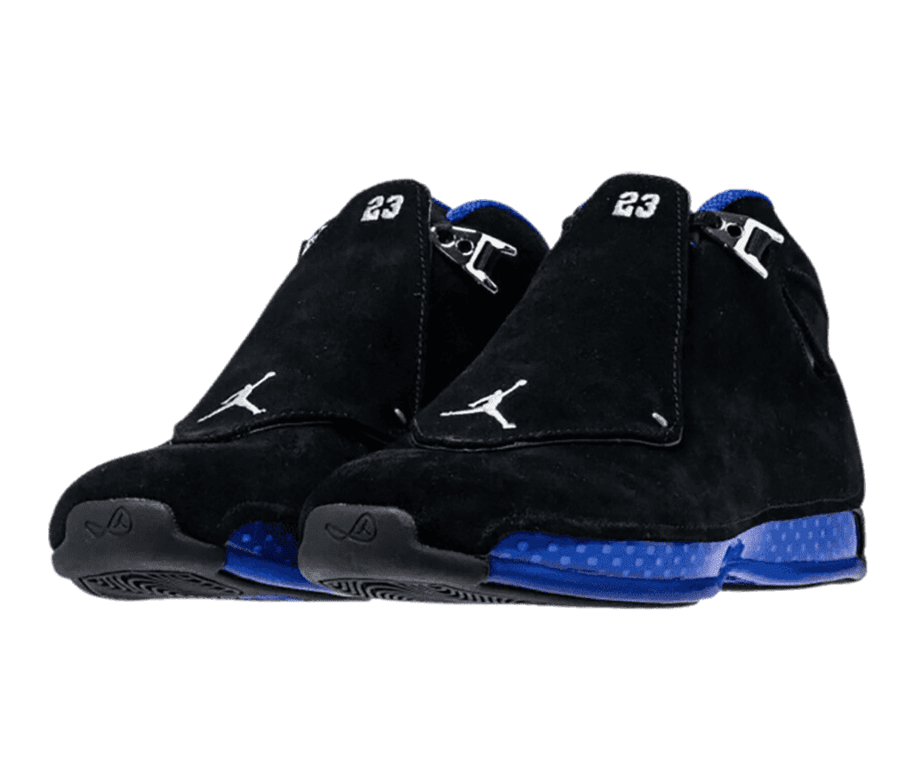 A suede pair of AJ18 “Black Sport Royal” sneakers with blue, polka-dotted, translucent midsoles.