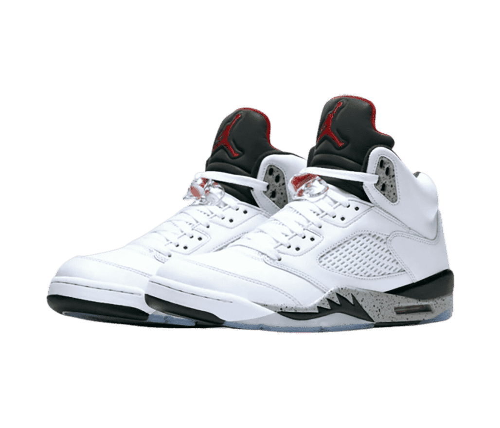 A pair of AJ5 “White Cement” sneakers with gray and speckled details.
