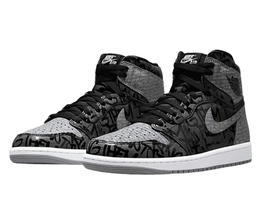A two-tone gray pair of AJ1 “Rebellionaire” sneakers with writing all-over that says “They Can't Stop You From Wearing Them.”