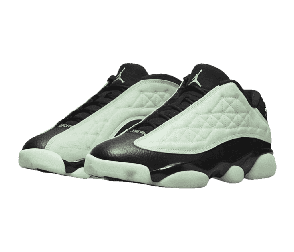 A black pair of AJ13 “Singles Day” sneakers with mint vamps and semi-translucent outsoles.