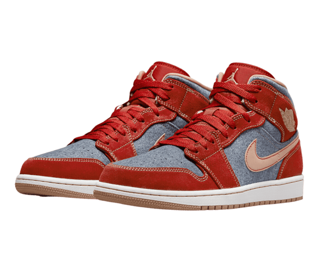 A pair of AJ1 Mid sneakers with blue denim uppers, red suede overlays, and beige Swooshes and outsoles.