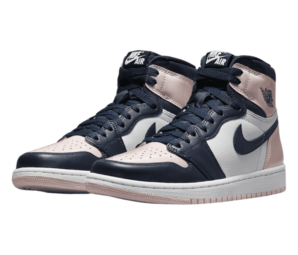 A pair of AJ1 High “Atmosphere” sneakers in navy, light pink, and white.