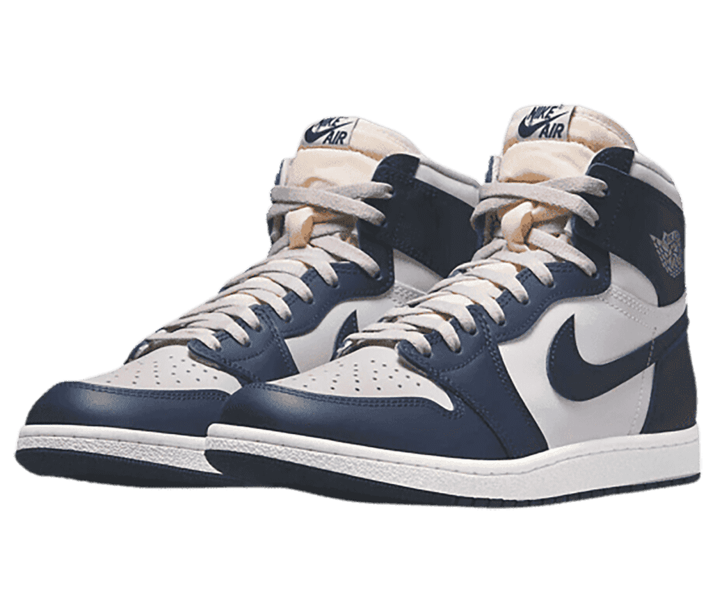 A pair of white AJ1 Mid “Georgetown” sneakers in white with navy overlays and off-white tongues.