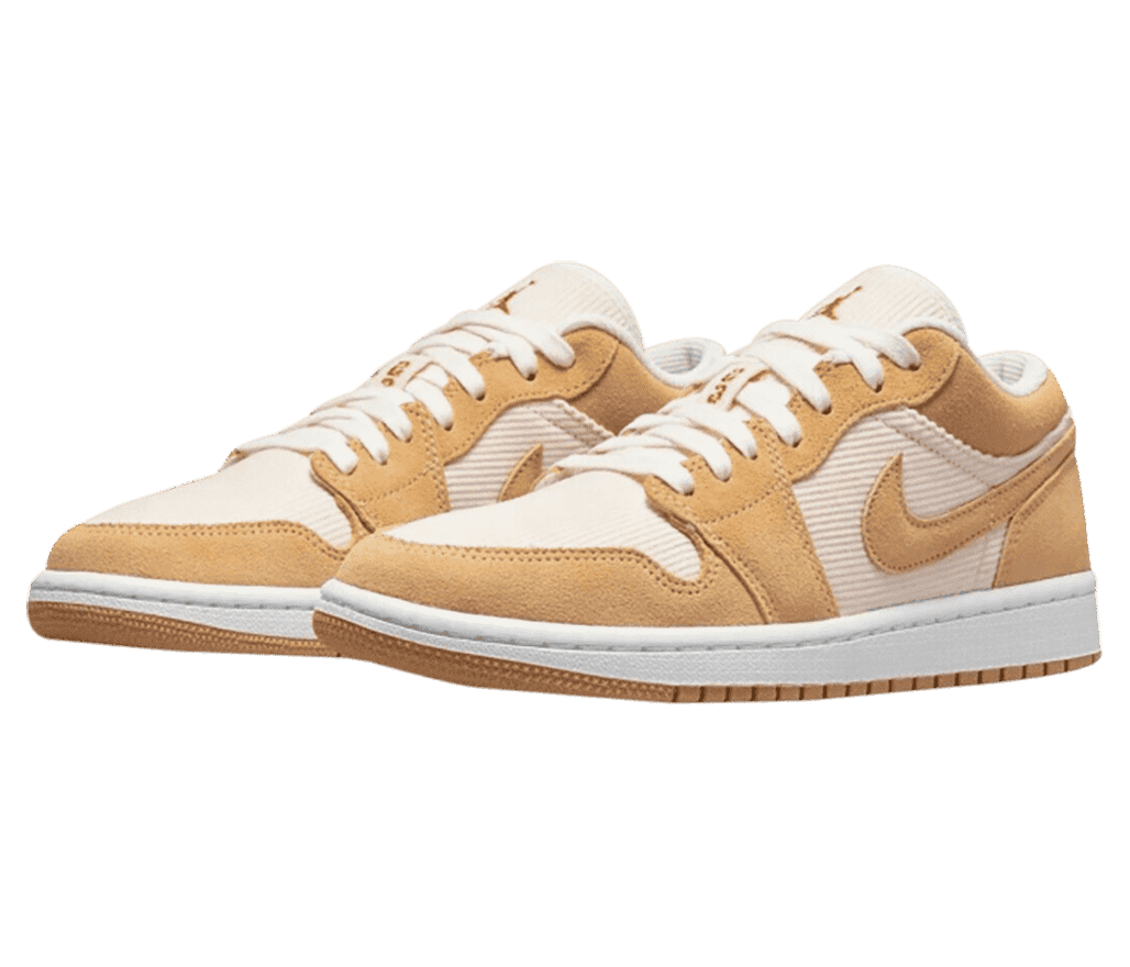 A pair of AJ1 Low sneakers in off-white corduroy uppers and light brown suede overlays.