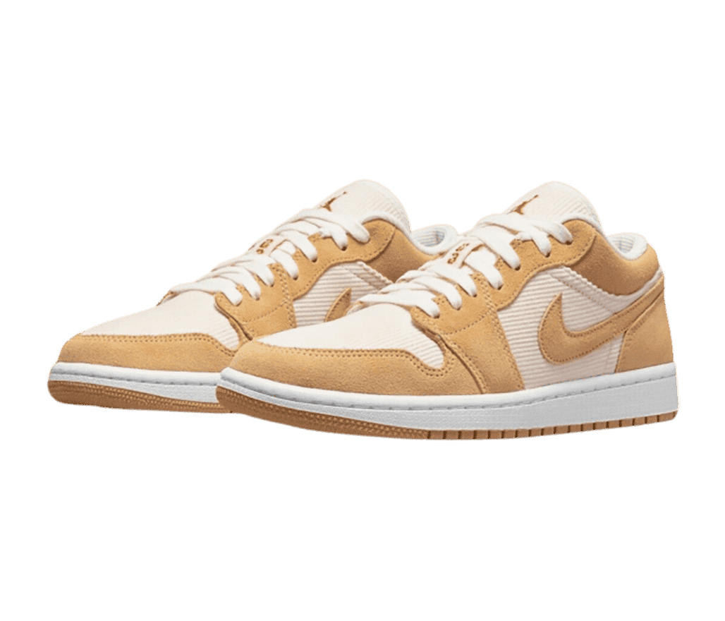 A pair of AJ1 Low sneakers in off-white corduroy uppers and light brown suede overlays.