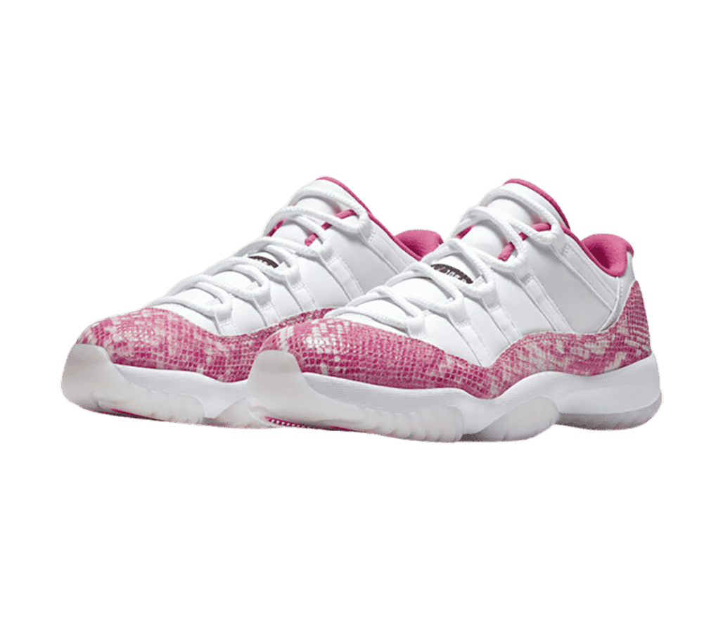 A white pair of AJ11 sneakers with pink snakeskin mudguards.