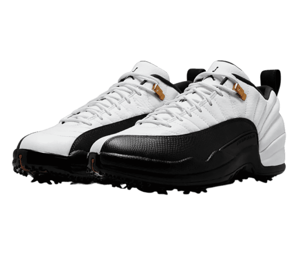 A white pair of AJ12 sneakers with black mudguards, soles, and golf cleats.