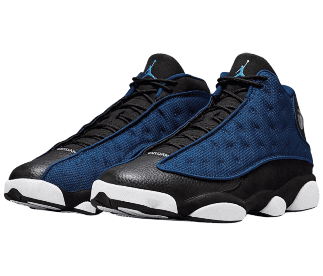 A black pair of AJ13 sneakers with navy vamps and white midsoles.