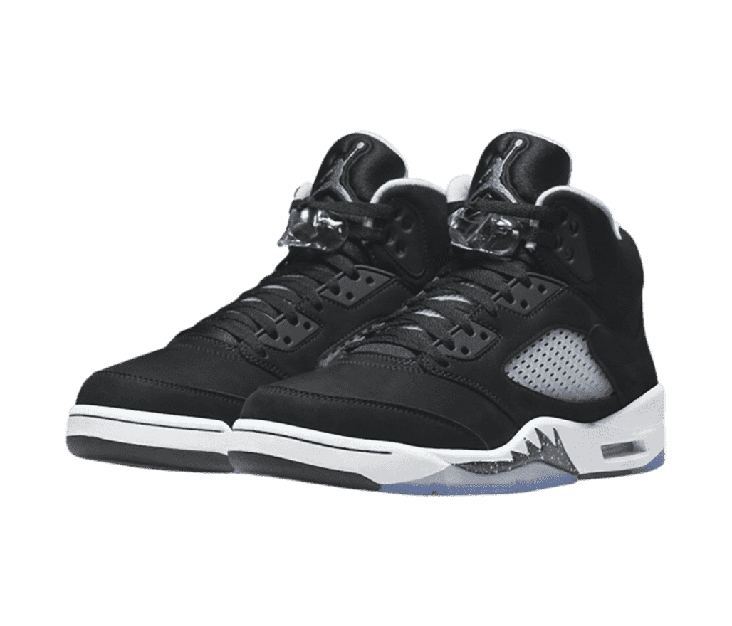 A pair of AJ5 sneakers in black suede with white midsoles and clear lace locks.