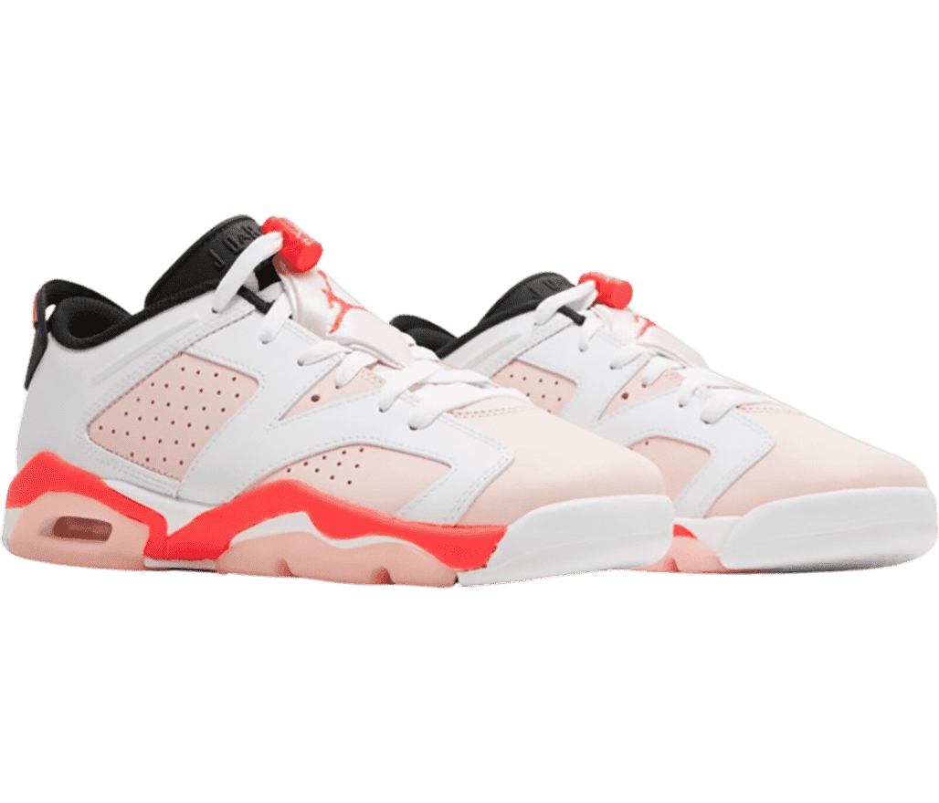 A light pink pair of AJ6 Low “Atmosphere” sneakers with white overlays, black tongues and lining, and hot pink accents.