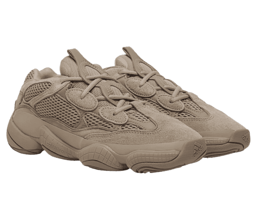 A pair of Adidas Yeezy 500 “Taupe Light” sneakers in off-white suede and mesh uppers.