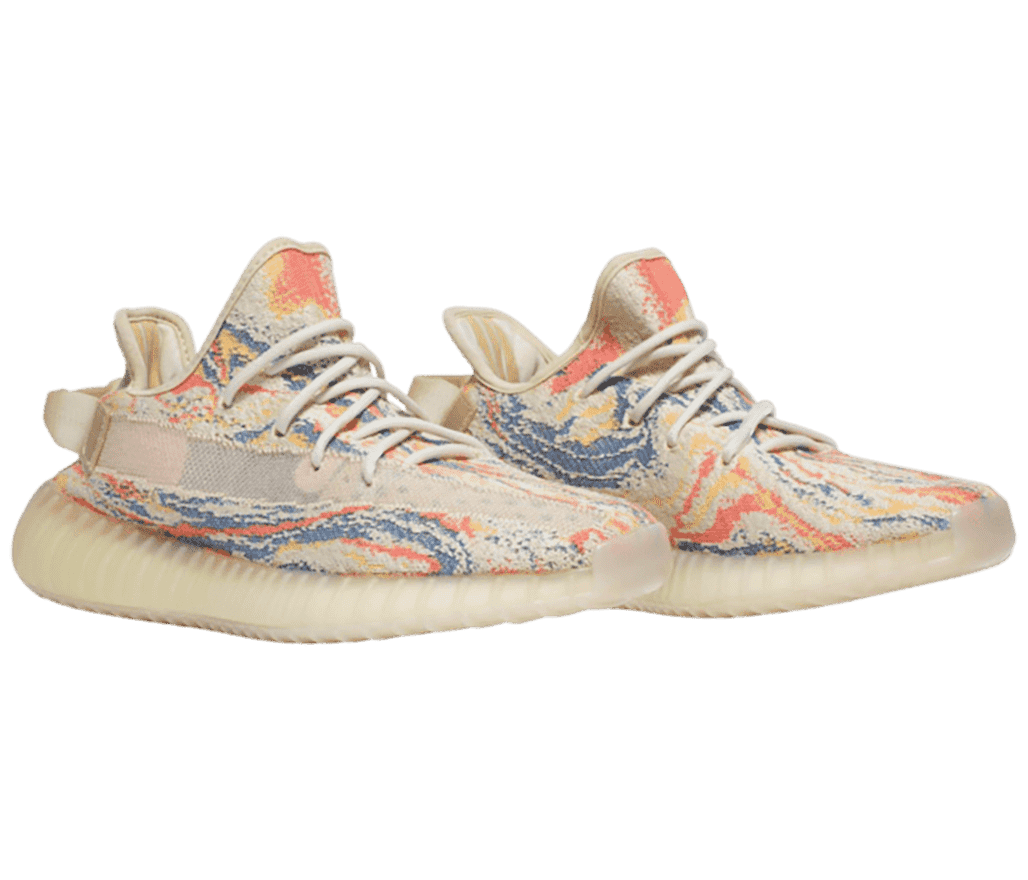 A cream pair of YEEZY Boost 350 “MX Oat” sneakers with off-white soles and blue and orange marbling all over the uppers.