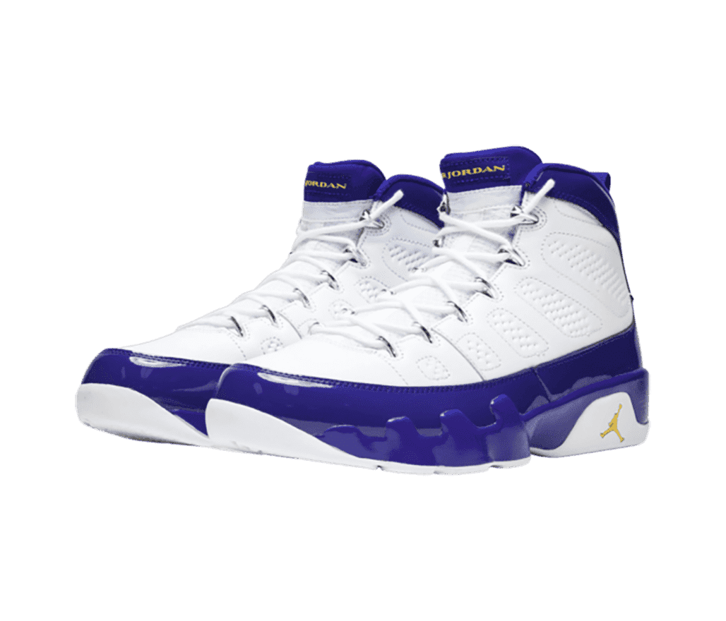 A pair of AJ9 “Kobe” sneakers with white uppers, blue mudguards and collars, and yellow Jumpman logos on the heels.