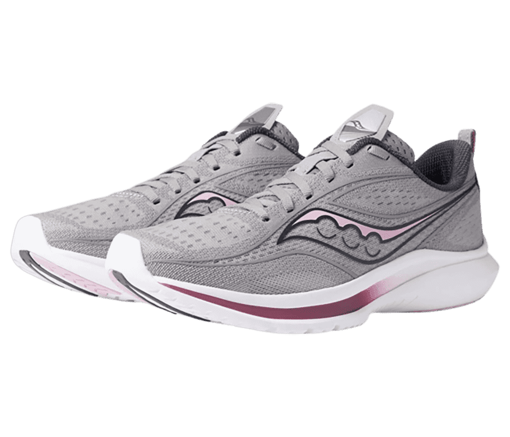 A pair of Saucony sneakers with gray mesh uppers, white soles, and pink detailing.
