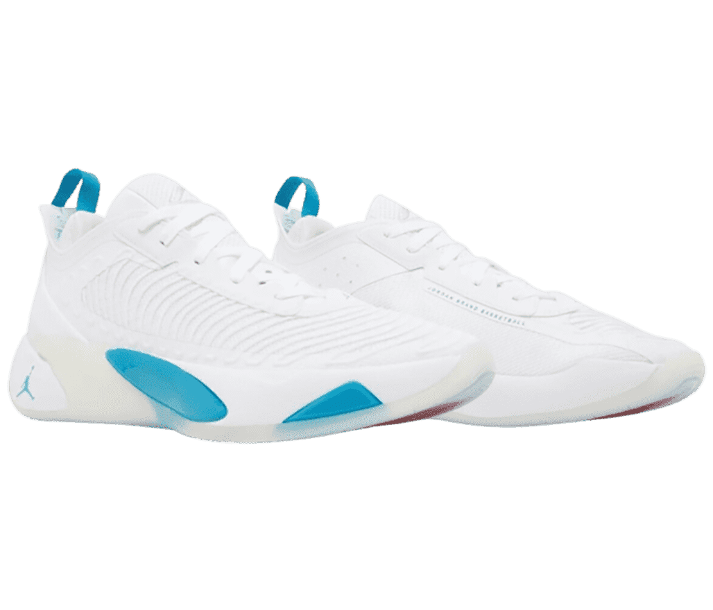 A white pair of Jordan Luka 1 sneakers with wavy lines stitched onto the uppers, off-white outsoles, and teal details.