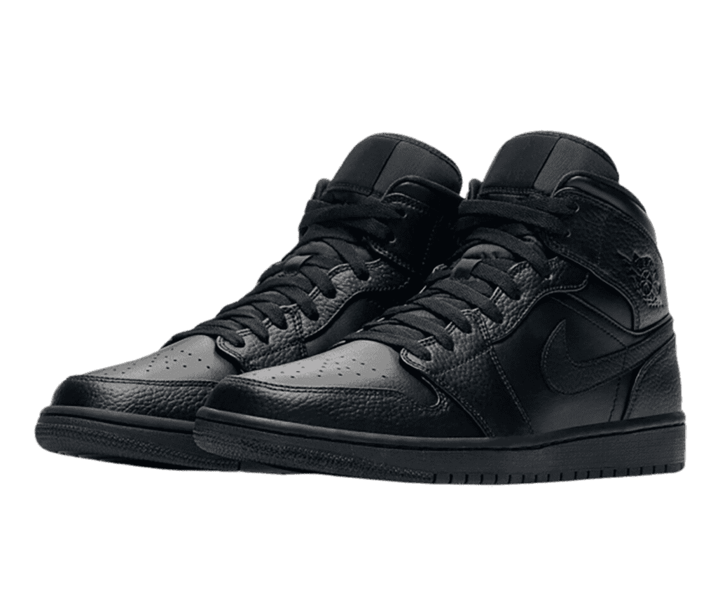 An all-black pair of AJ1 Mid sneakers with tumbled leather overlays.
