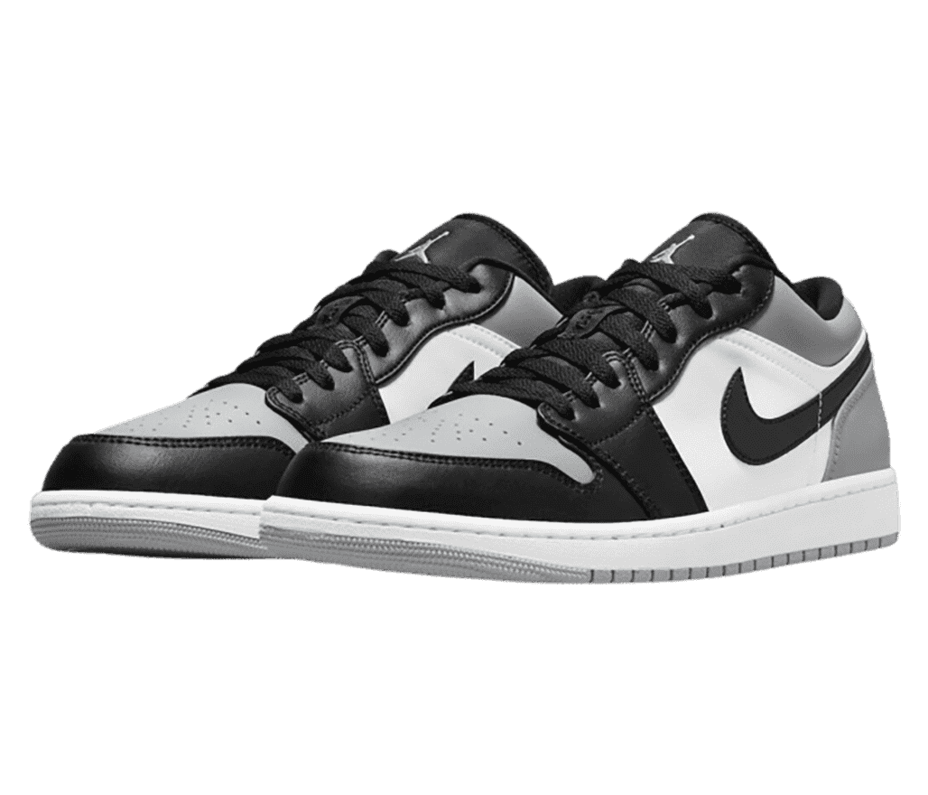 A pair of AJ1 Low sneakers in black, white, and gray.