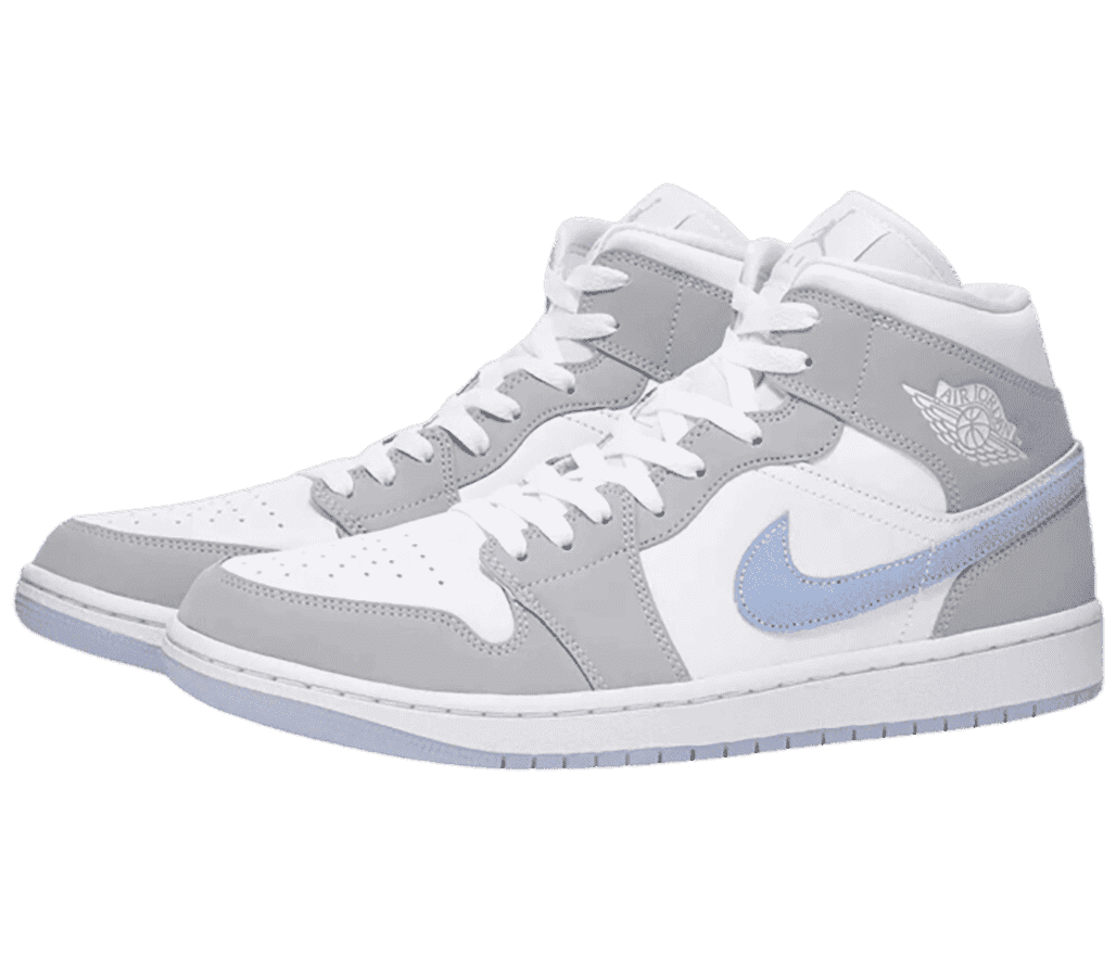 A white suede pair of AJ1 Mid sneakers with gray overlays and light blue Swooshes and outsoles.