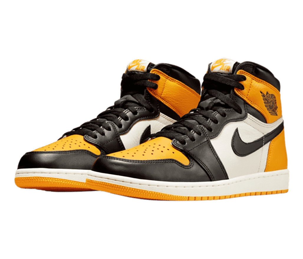 A pair of AJ1 Mid sneakers in black, white, and gold leather.