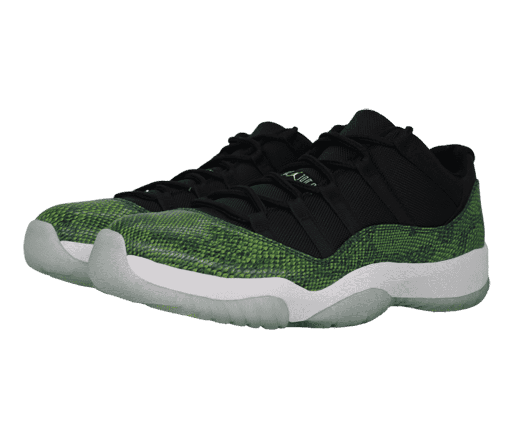 A black pair of AJ11 Low sneakers with with green snakeskin overlays, white midsoles, and gray semi-translucent outsoles.