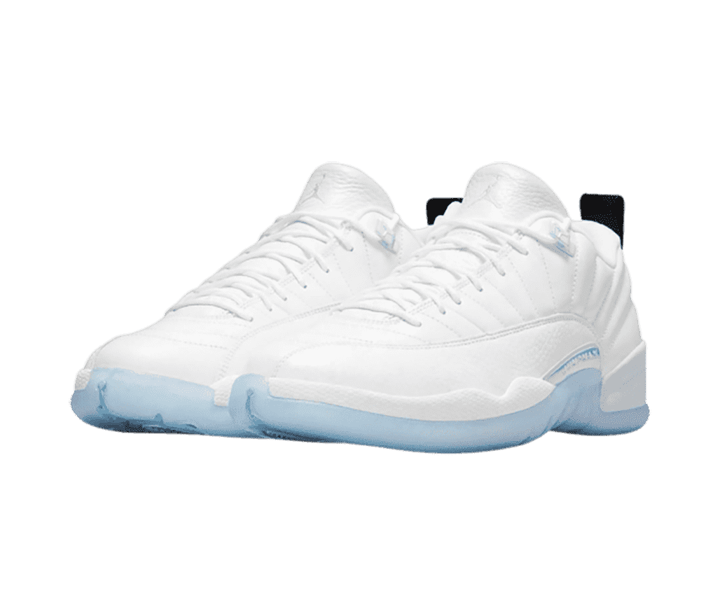 A white pair of AJ12 Low sneakers with light blue semi-translucent outsoles.