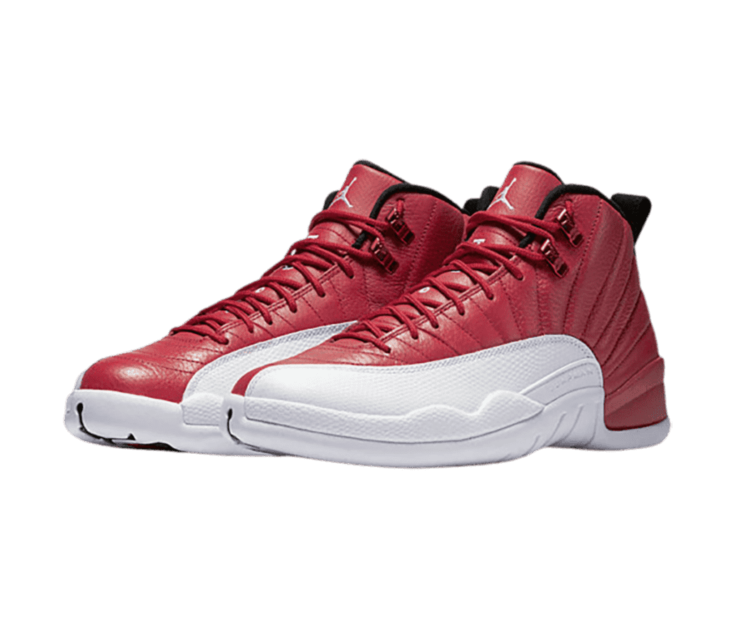 A red pair of AJ12 sneakers with white mudguards and outsoles.