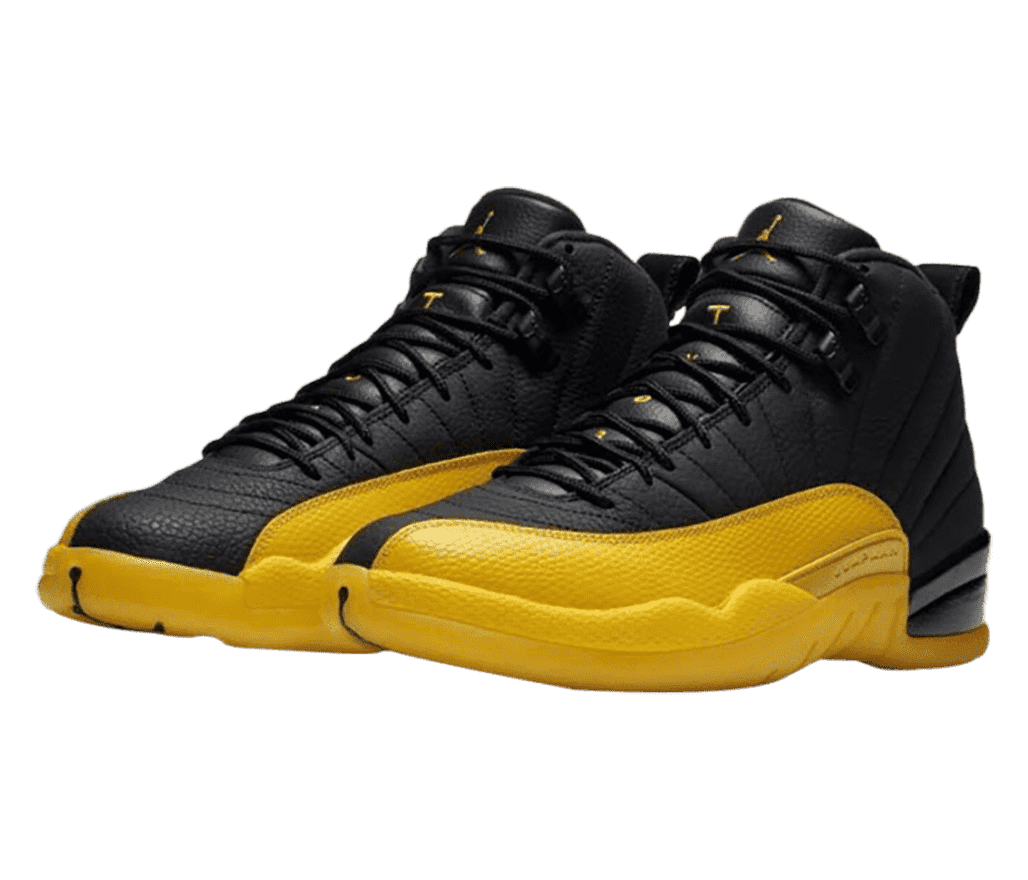 A black pair of AJ12 sneakers with yellow mudguards.
