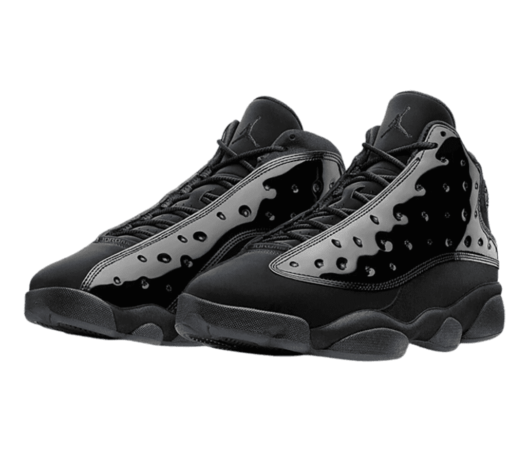 A black suede pair of AJ13 sneakers with patent leather vamps.