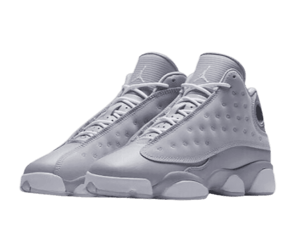 An all-gray pair of AJ13 sneakers with suede vamps.