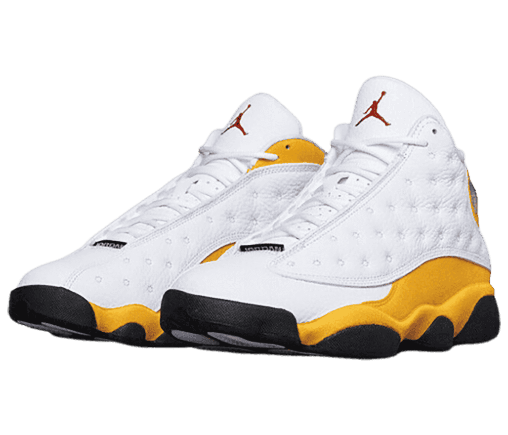 A white pair of AJ13 sneakers with gold suede midsoles and collars and black outsoles.