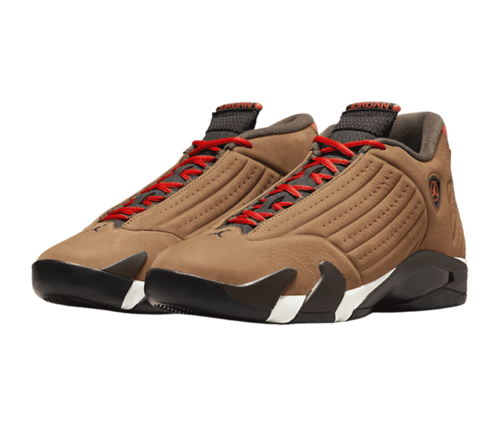 A pair of AJ14 sneakers in brown suede, black and white soles, red laces, and dark brown fleece lining.