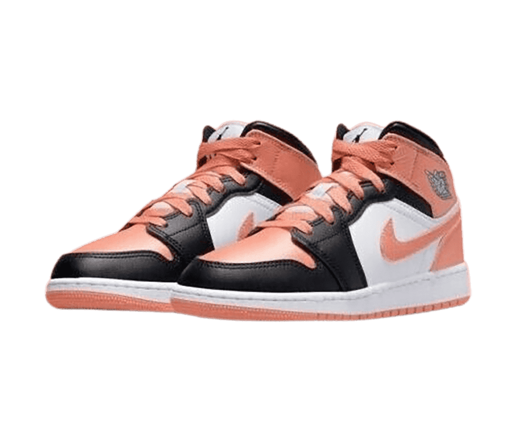 A pair of AJ1 Mid sneakers in black, white, and salmon uppers.
