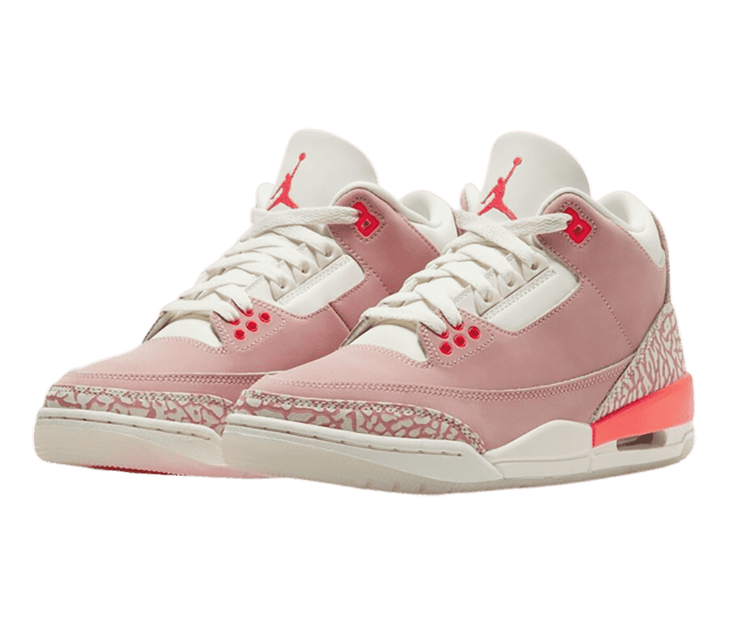 A pink suede and cream pair of AJ3 sneakers with pink elephant print heels and tips.