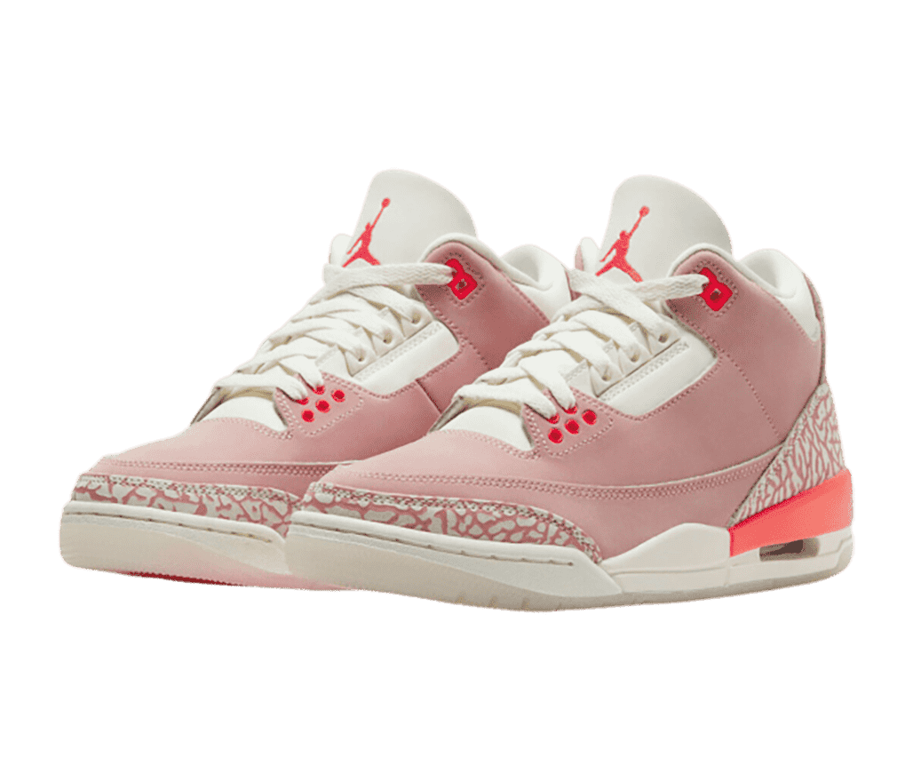 A pink suede and cream pair of AJ3 sneakers with pink elephant print heels and tips.