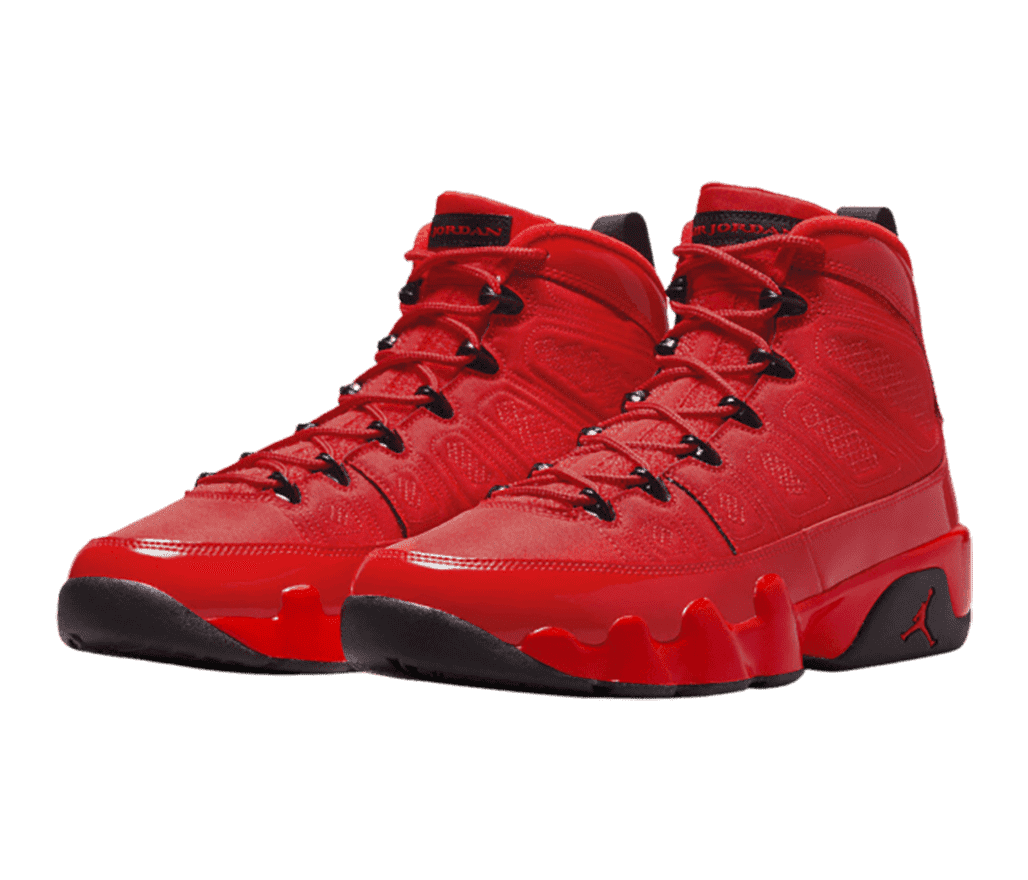 A vibrant red pair of AJ9 sneakers with black lace locks, dark gray outsoles, and patent leather mudguards.