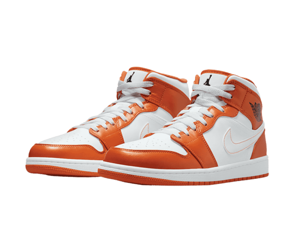 A pair of AJ1 Mid “Electro Orange” sneakers with white uppers, orange overlays, and white Swooshes with orange outlines.