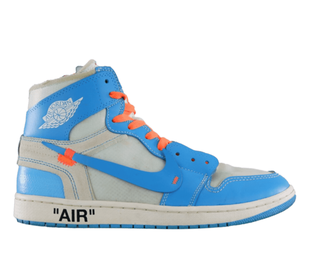 A side shot of a light-blue and gray Air Jordan sneaker. The shoelaces are orange, and the Nike logo on the side has tiny orange accents. On the sole, the word 'AIR' is written in black.