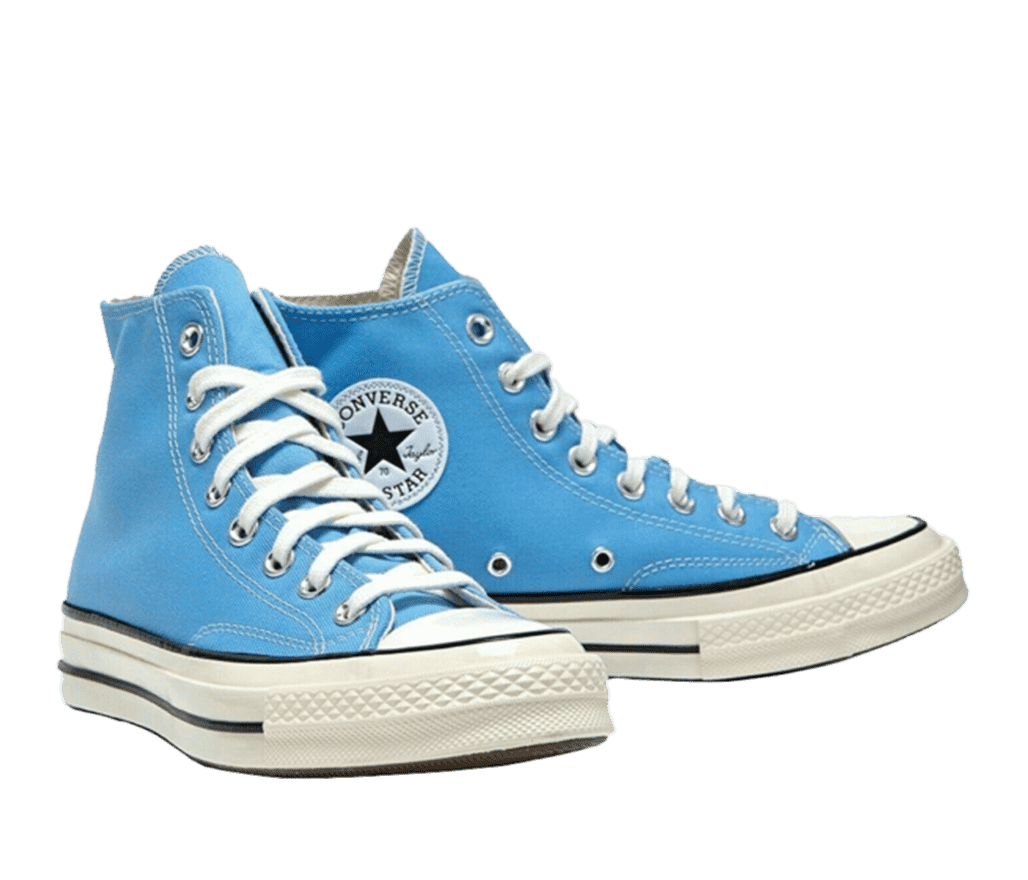 A pair of light-blue Converse All Star shoes with white shoelaces.