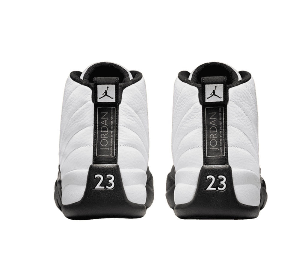 Back view of a pair of Jordan high top sneakers. The shoe is corium leather white with a black strip up the back. The number 23 is at the base in white stitching. 'JORDAN' is written up the back in gold lettering and the top of the shoe has a black Jumpman logo in a white block 