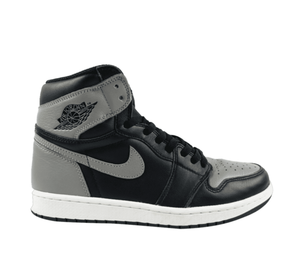 A side shot of an Air Jordan 1 high-top sneaker. The shoe is primarily black leather, with a gray Nike swoosh and gray on the toe and back of the shoe. A gray Air Jordan logo sits at the top of the collar.