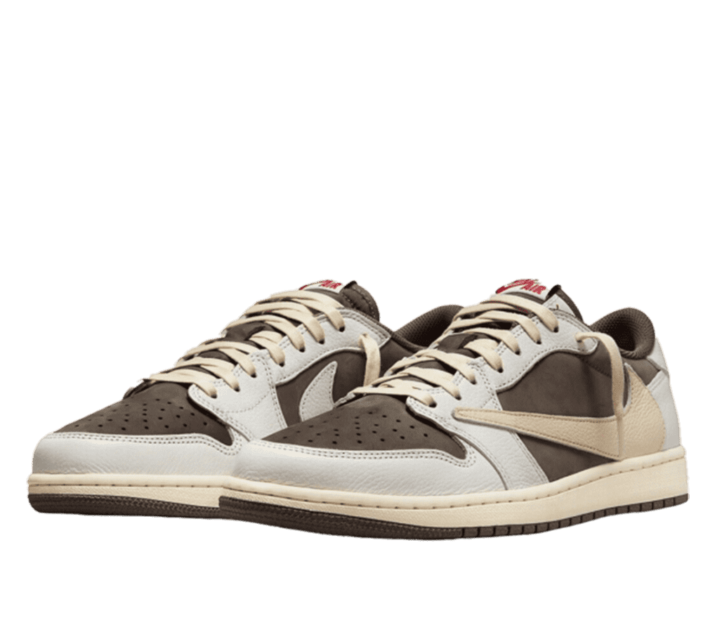 A pair of Air Jordan 1 lows in a white and brown colourway. Brown suede makes up the lower layer with white leather overlays. The cream colored Nike swoosh is reversed from the usual direction. The sole is brown on the bottom and off-white on the sides.