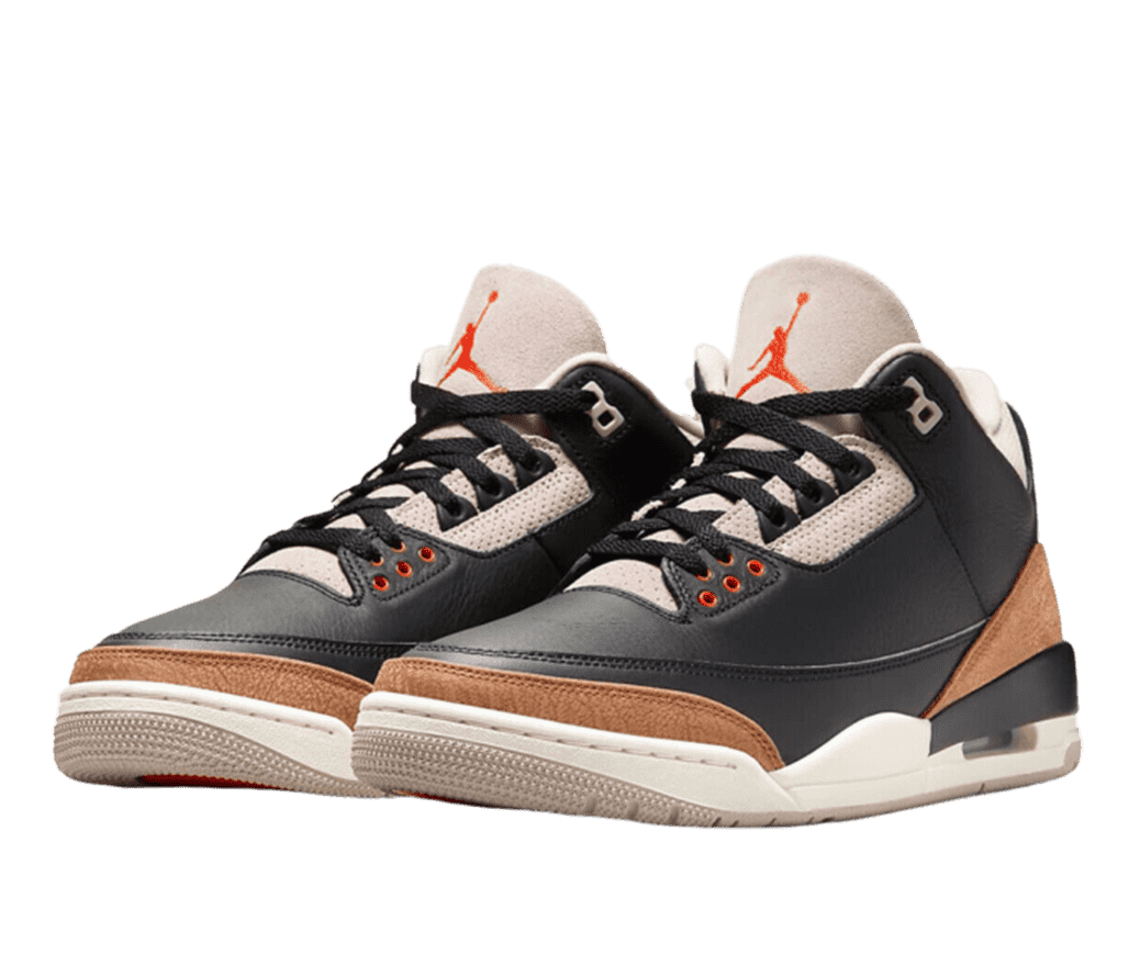 A pair of Air Jordan 3 sneakers in a black and brown colorway. The shoe upper is primarily smooth black leather with off-white fabric around the laces and tongue. Brown elephant-pattern leather sits above the off-white and gray sole. Orange Jumpman logo on the tongue.