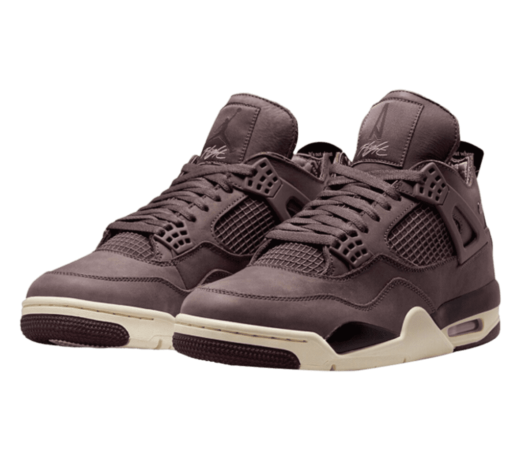 A pair of Air Jordan 4s in a luxurious purple-brown leather. The sole is cream coloured with a similar purple-brown section on the front and back.