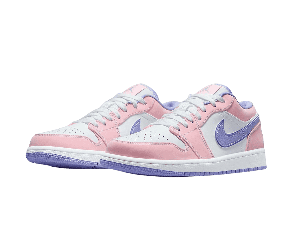 A pair of AJ1 Low “Arctic Punch” sneakers in white quarters and toeboxes, pink overlays, and purple outsoles and lining.
