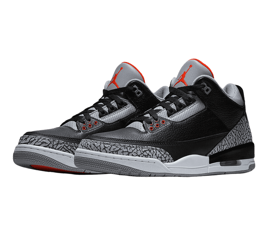 A black pair of AJ3 “Black Cement” sneakers with gray outsoles and tongues, black and gray elephant print tips and heels, and red Jordan logo.